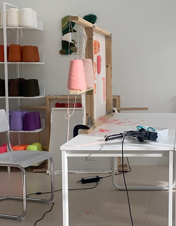 Craft room with yarn and a sewing table